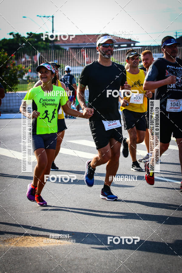 Buy your photos of the eventguia 13K Praia Grande on Fotop