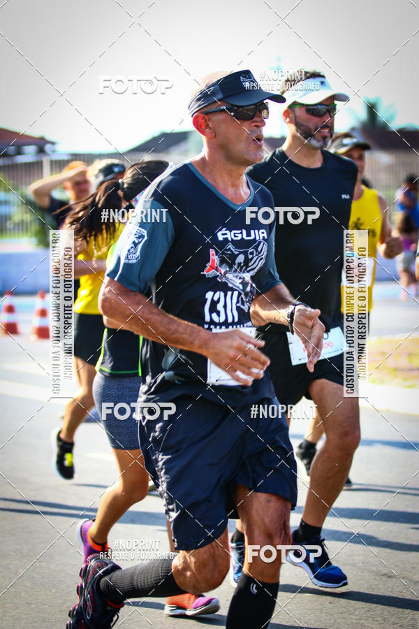 Buy your photos of the eventguia 13K Praia Grande on Fotop