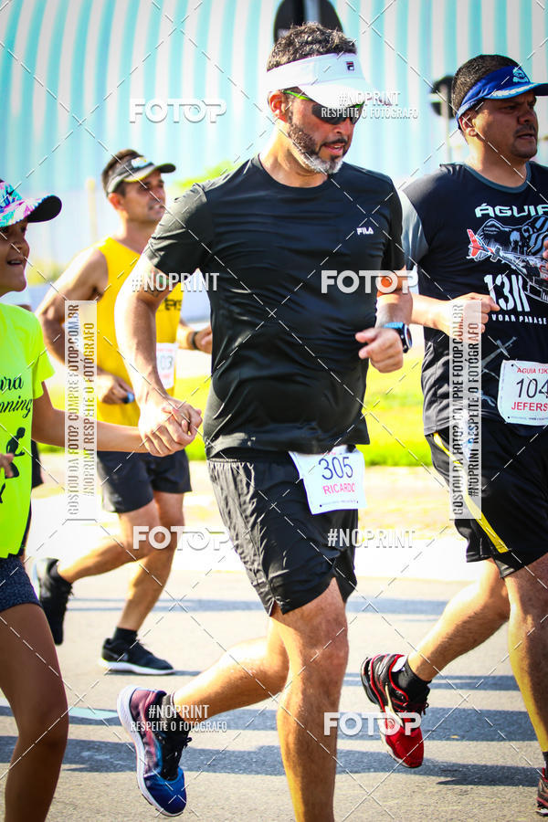 Buy your photos of the eventguia 13K Praia Grande on Fotop
