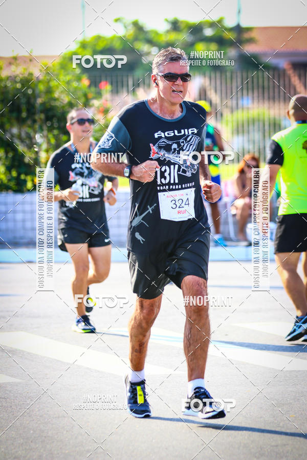 Buy your photos of the eventguia 13K Praia Grande on Fotop