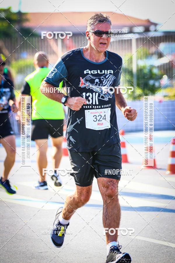 Buy your photos of the eventguia 13K Praia Grande on Fotop