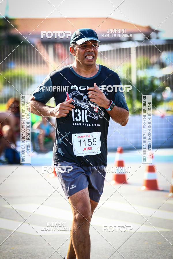 Buy your photos of the eventguia 13K Praia Grande on Fotop