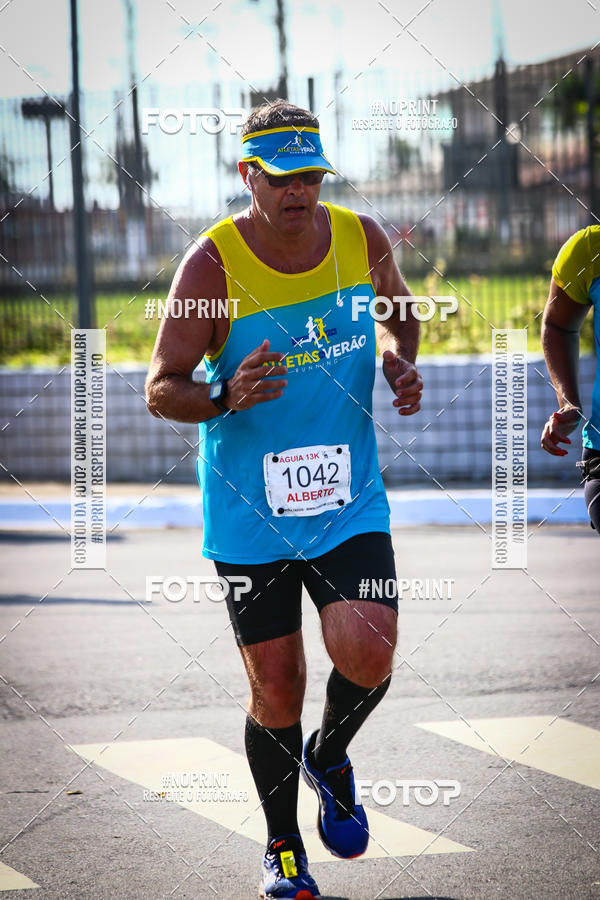 Buy your photos of the eventguia 13K Praia Grande on Fotop