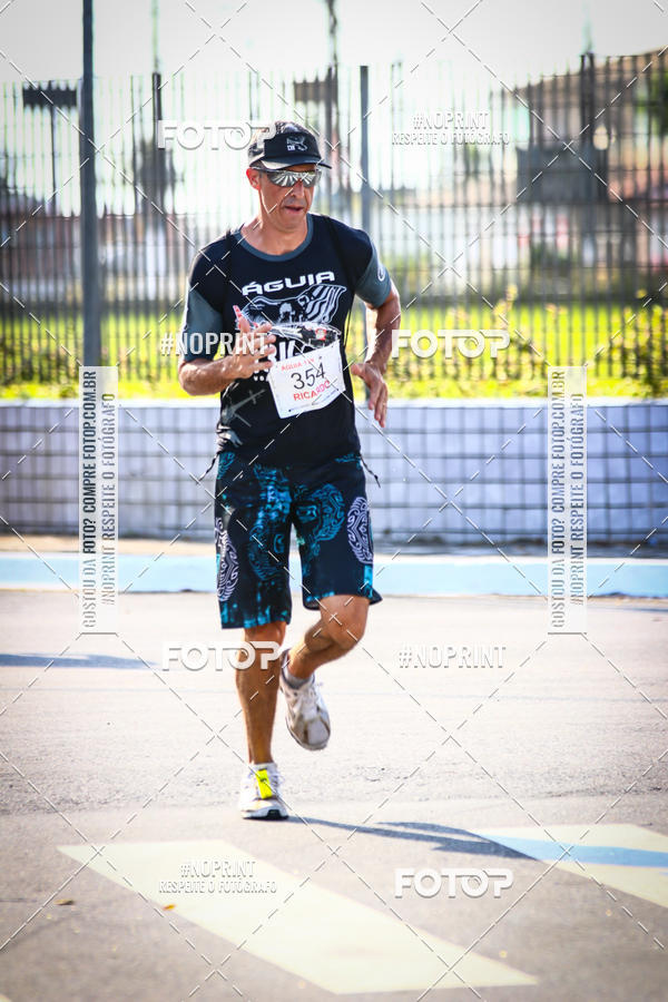 Buy your photos of the eventguia 13K Praia Grande on Fotop