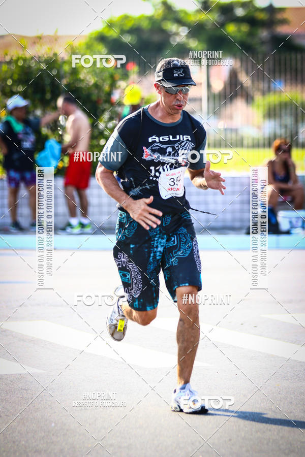 Buy your photos of the eventguia 13K Praia Grande on Fotop