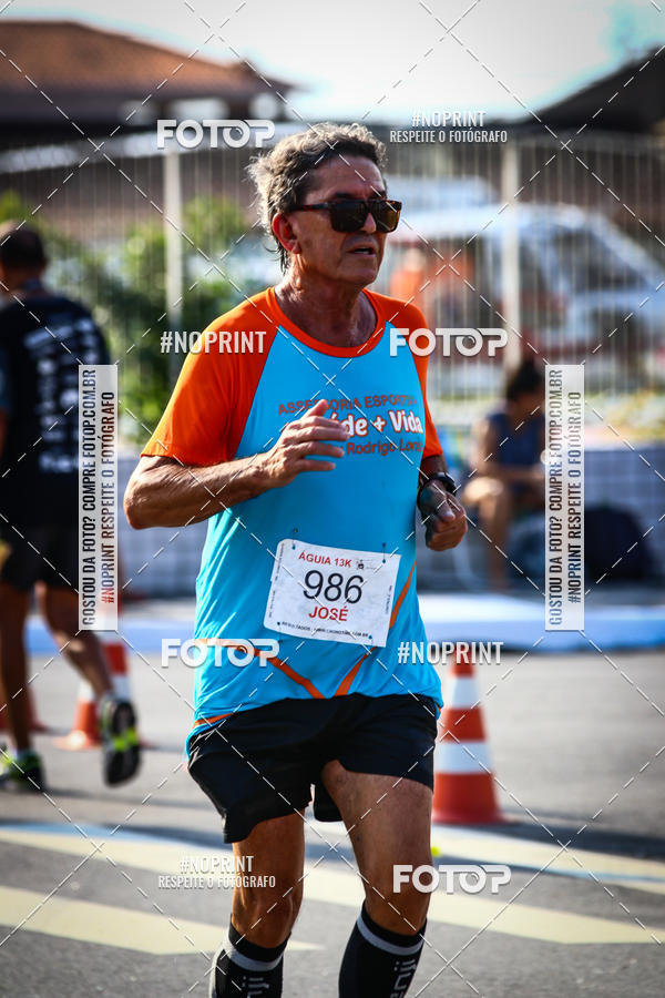Buy your photos of the eventguia 13K Praia Grande on Fotop