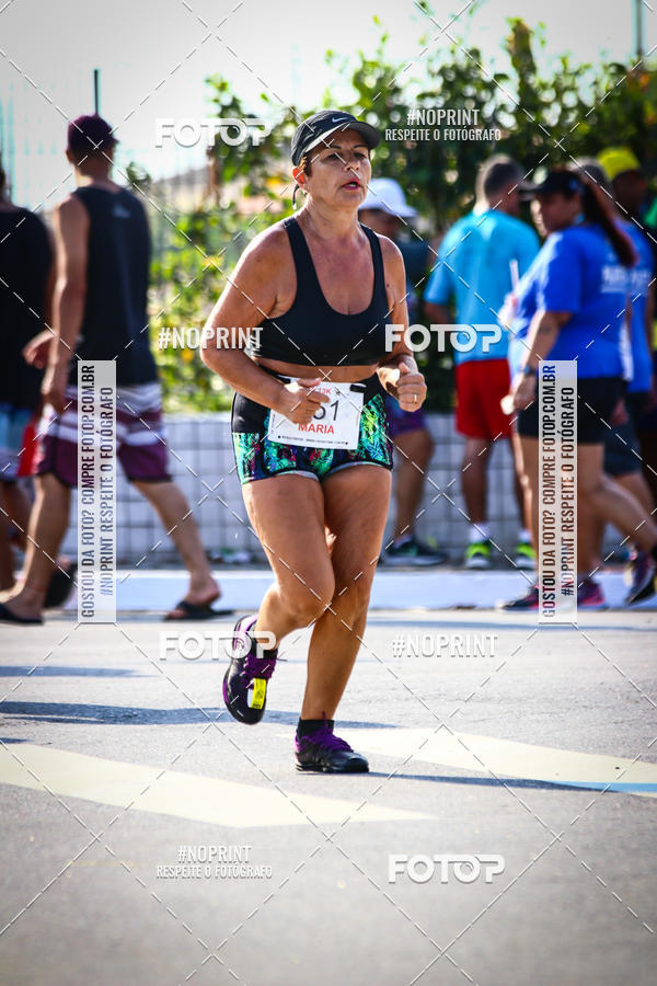 Buy your photos of the eventguia 13K Praia Grande on Fotop