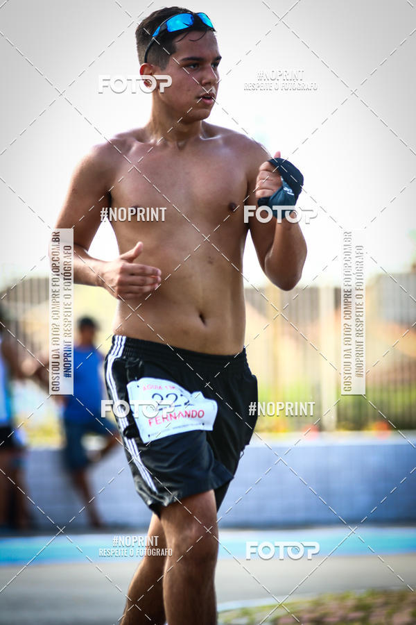 Buy your photos of the eventguia 13K Praia Grande on Fotop