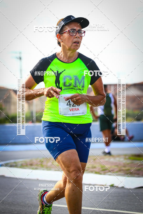 Buy your photos of the eventguia 13K Praia Grande on Fotop