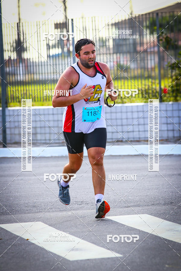 Buy your photos of the eventguia 13K Praia Grande on Fotop