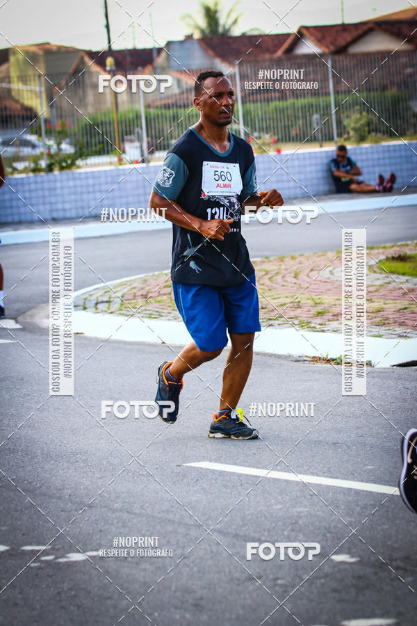 Buy your photos of the eventguia 13K Praia Grande on Fotop