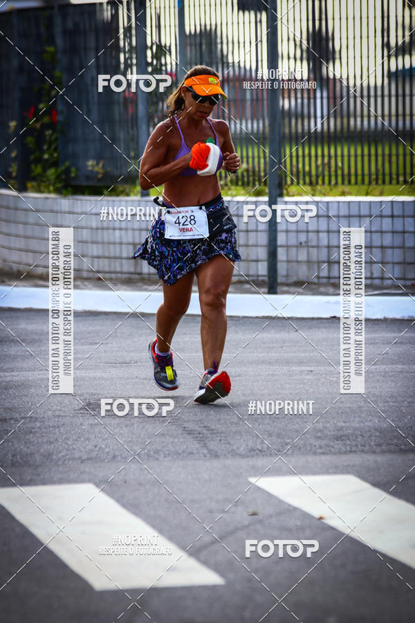 Buy your photos of the eventguia 13K Praia Grande on Fotop