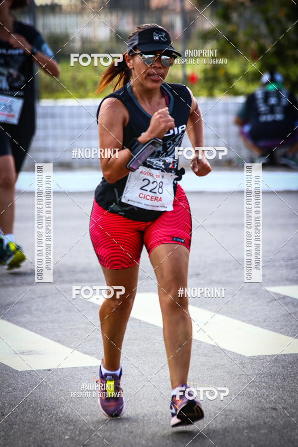 Buy your photos of the eventguia 13K Praia Grande on Fotop