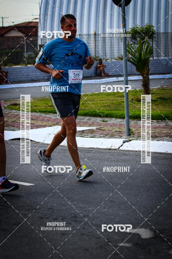 Buy your photos of the eventguia 13K Praia Grande on Fotop