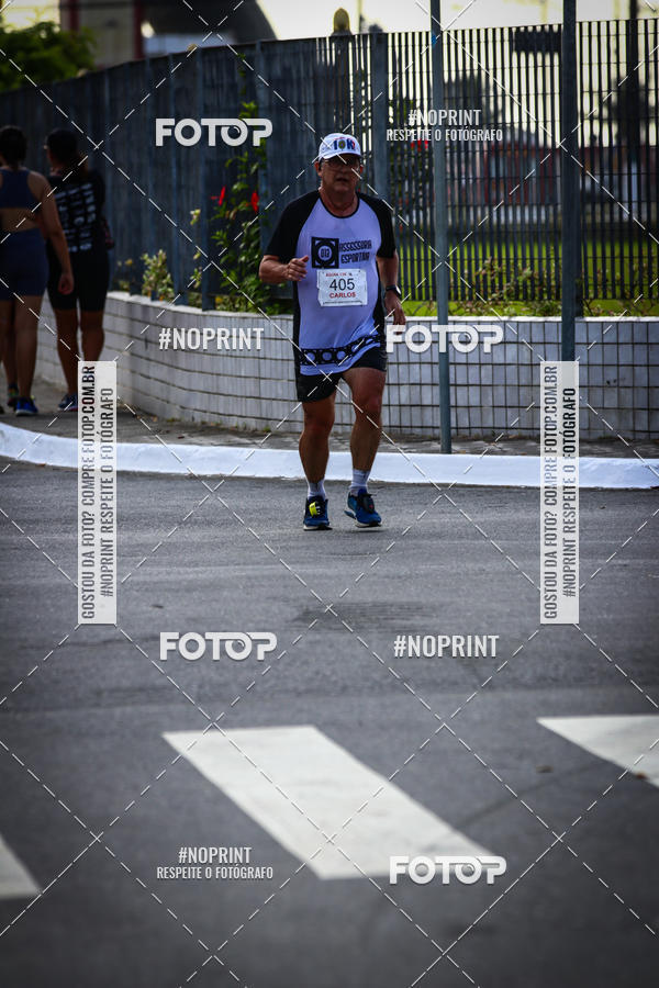 Buy your photos of the eventguia 13K Praia Grande on Fotop