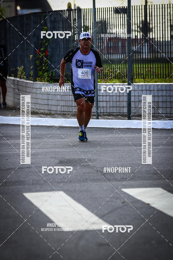 Buy your photos of the eventguia 13K Praia Grande on Fotop