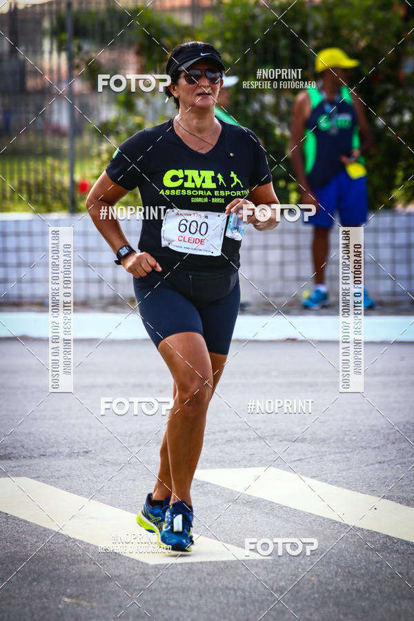 Buy your photos of the eventguia 13K Praia Grande on Fotop