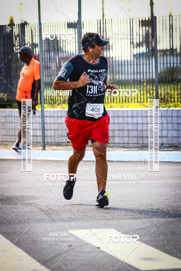 Buy your photos of the eventguia 13K Praia Grande on Fotop