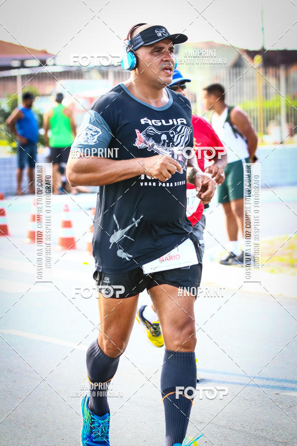 Buy your photos of the eventguia 13K Praia Grande on Fotop