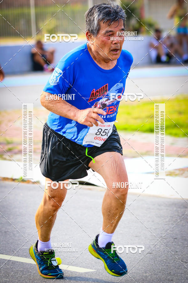 Buy your photos of the eventguia 13K Praia Grande on Fotop