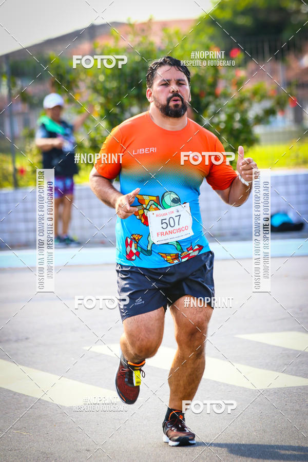 Buy your photos of the eventguia 13K Praia Grande on Fotop