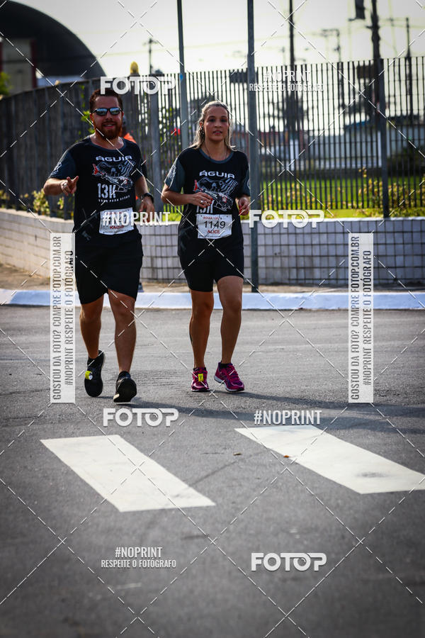 Buy your photos of the eventguia 13K Praia Grande on Fotop