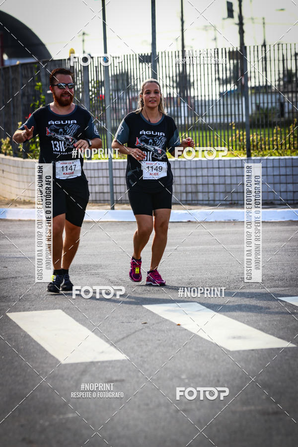 Buy your photos of the eventguia 13K Praia Grande on Fotop