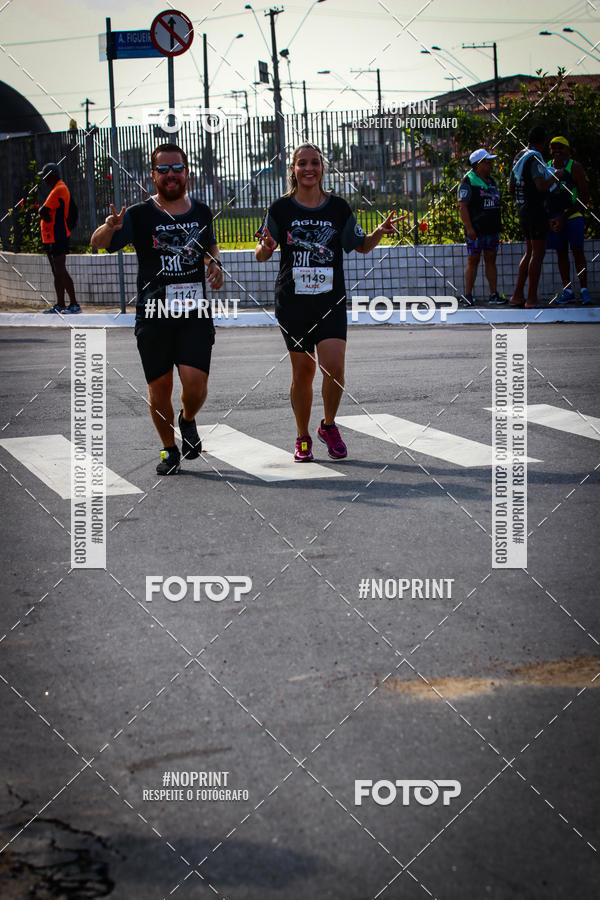 Buy your photos of the eventguia 13K Praia Grande on Fotop