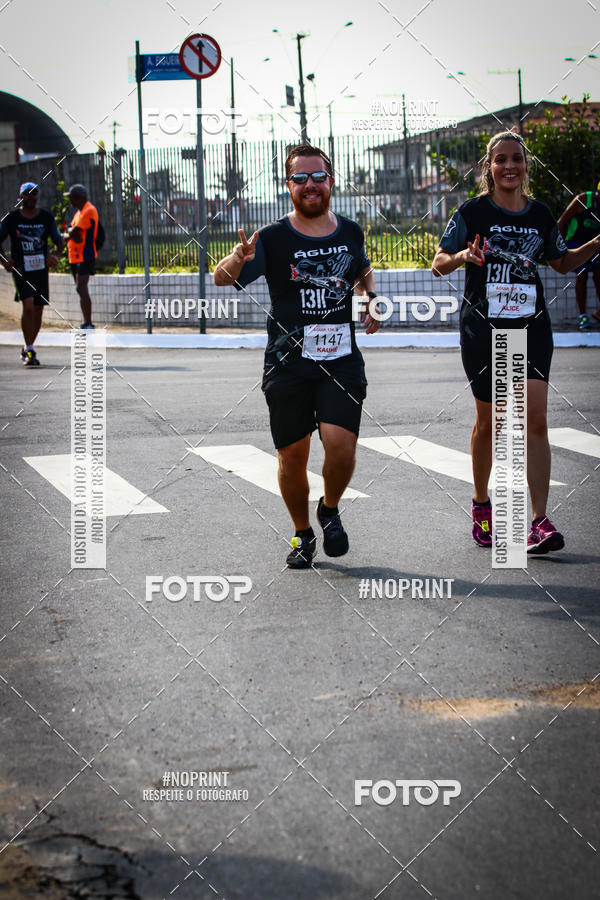 Buy your photos of the eventguia 13K Praia Grande on Fotop