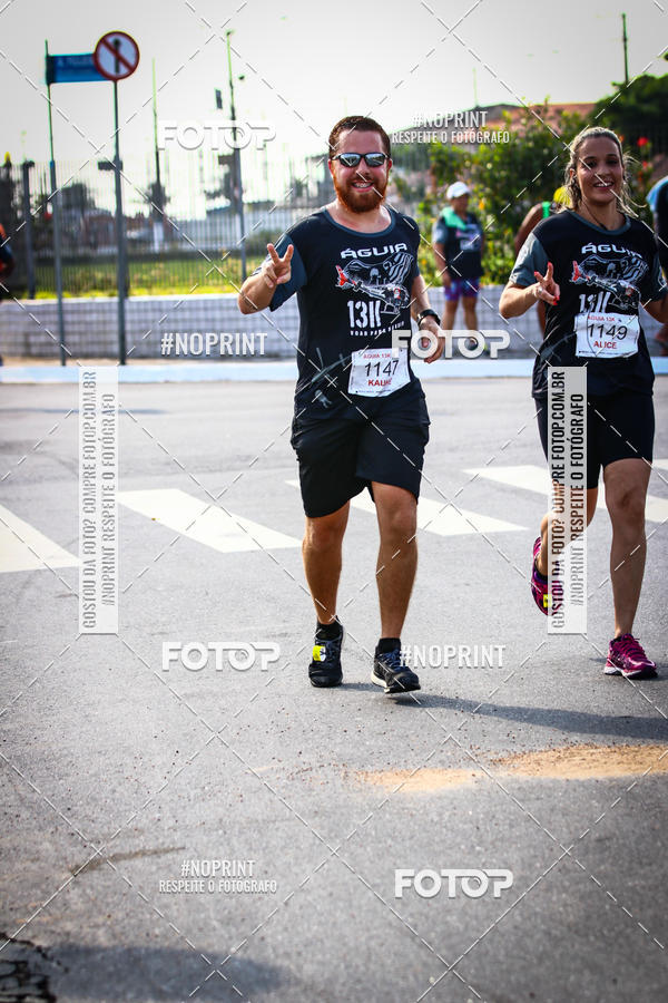 Buy your photos of the eventguia 13K Praia Grande on Fotop