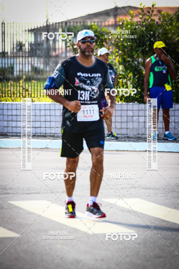 Buy your photos of the eventguia 13K Praia Grande on Fotop