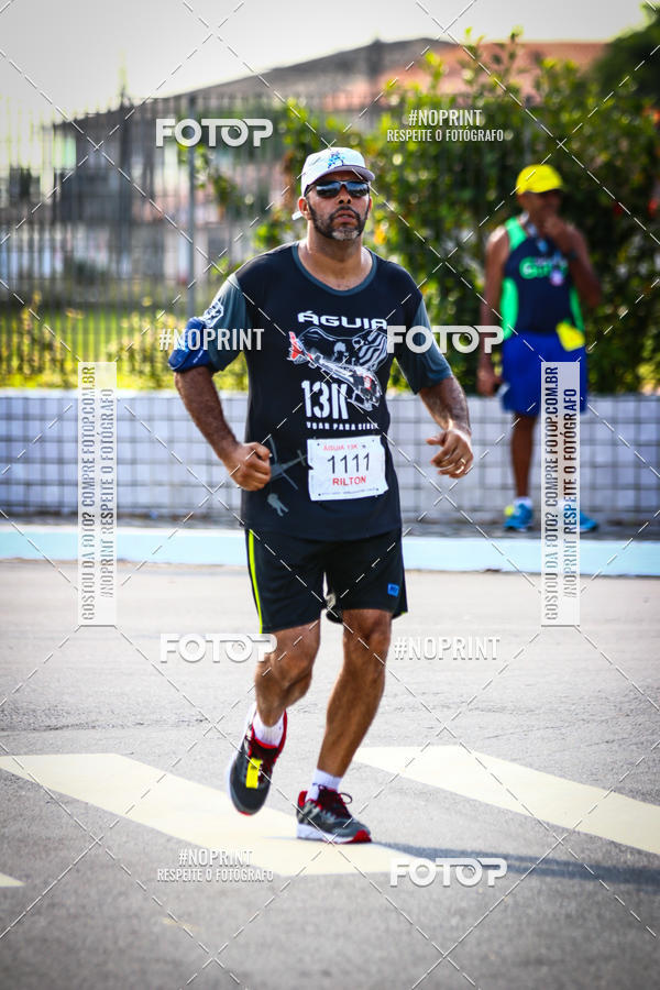 Buy your photos of the eventguia 13K Praia Grande on Fotop