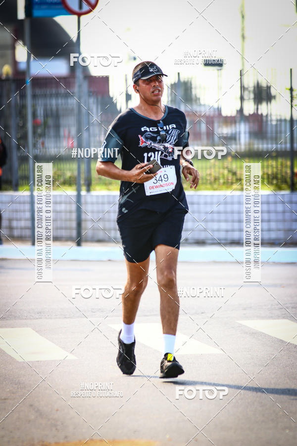 Buy your photos of the eventguia 13K Praia Grande on Fotop