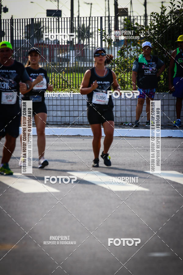 Buy your photos of the eventguia 13K Praia Grande on Fotop