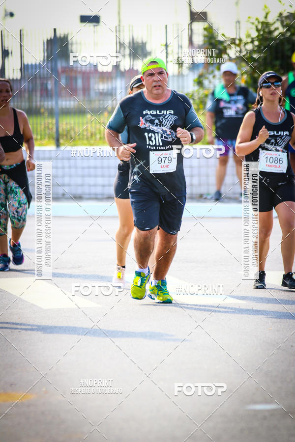 Buy your photos of the eventguia 13K Praia Grande on Fotop