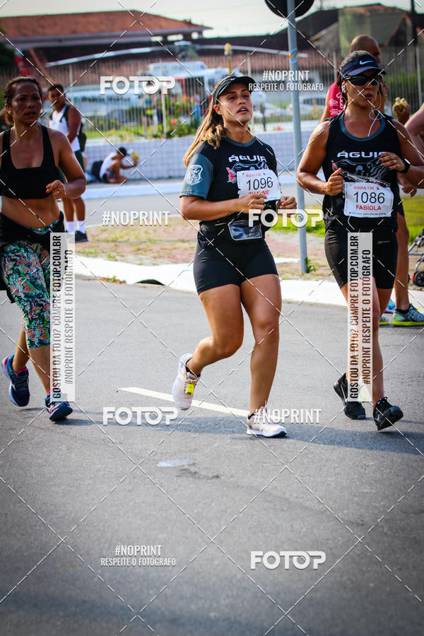 Buy your photos of the eventguia 13K Praia Grande on Fotop
