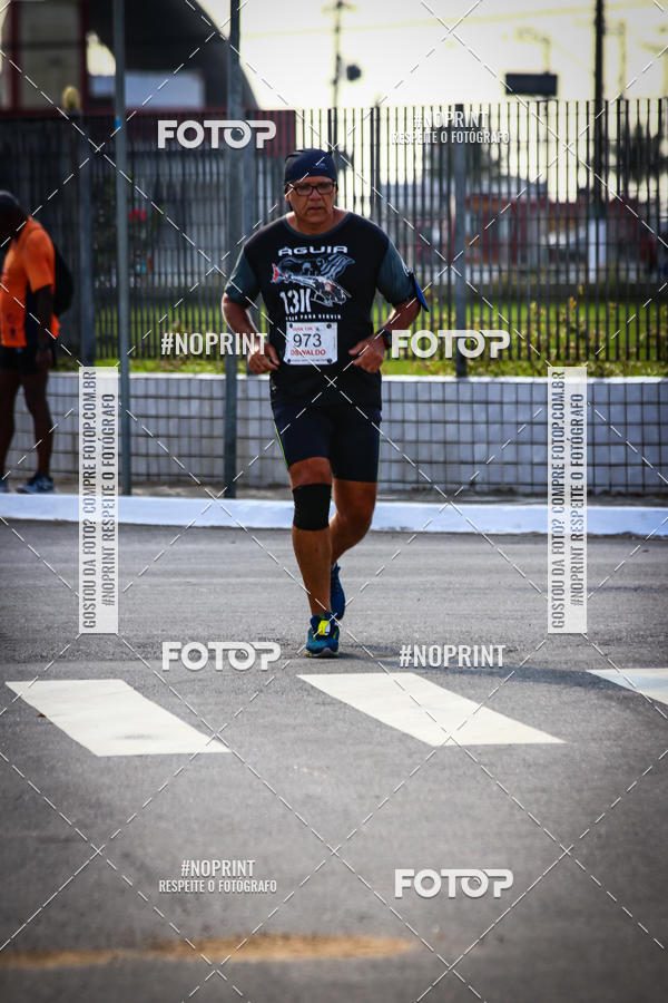 Buy your photos of the eventguia 13K Praia Grande on Fotop