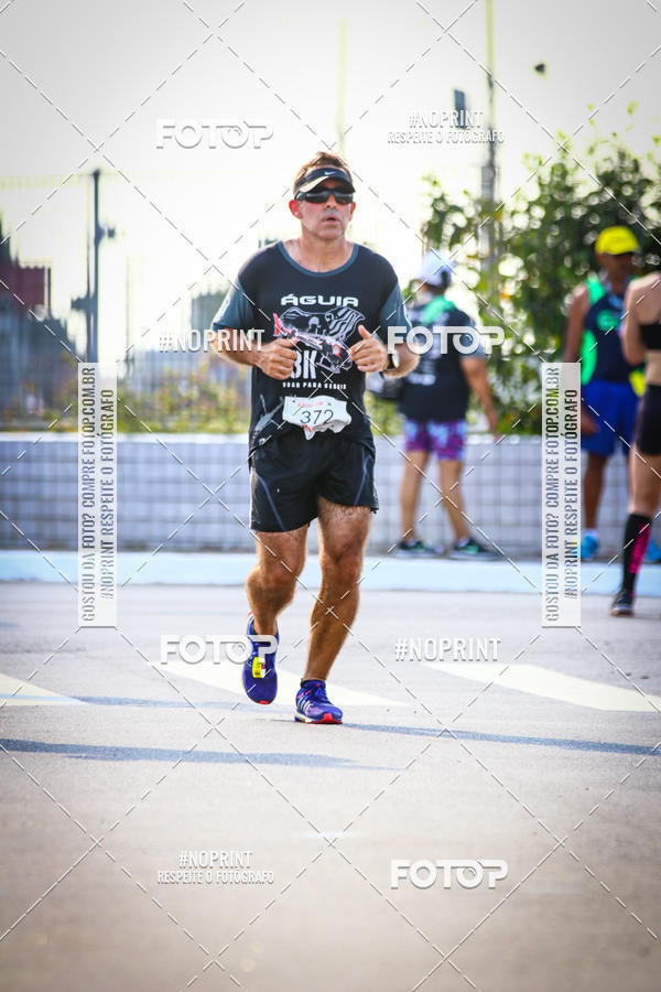 Buy your photos of the eventguia 13K Praia Grande on Fotop