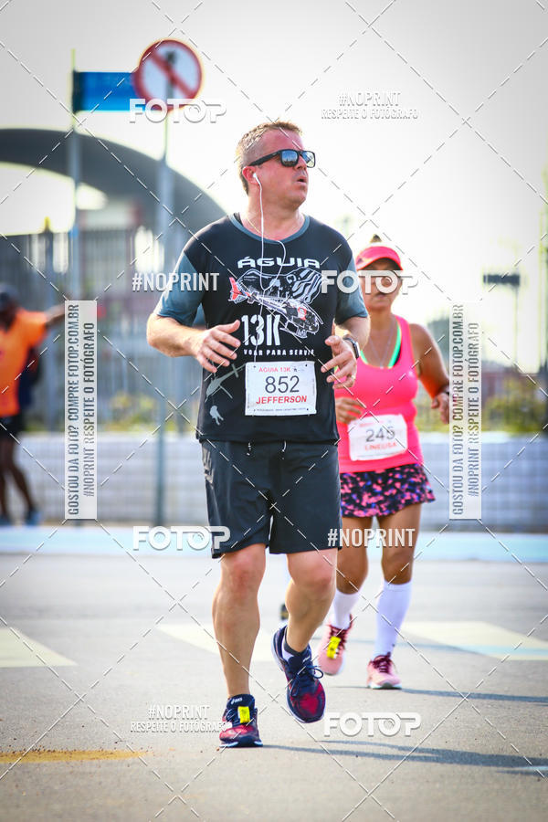 Buy your photos of the eventguia 13K Praia Grande on Fotop