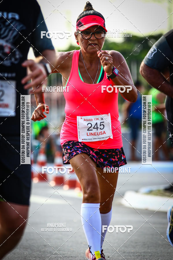 Buy your photos of the eventguia 13K Praia Grande on Fotop