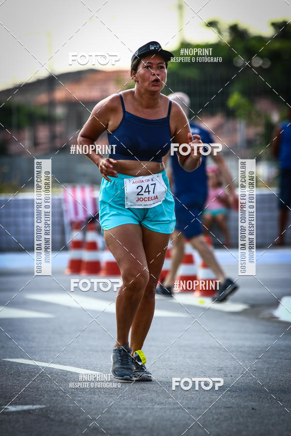 Buy your photos of the eventguia 13K Praia Grande on Fotop