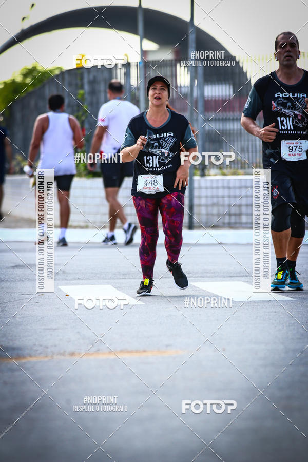 Buy your photos of the eventguia 13K Praia Grande on Fotop