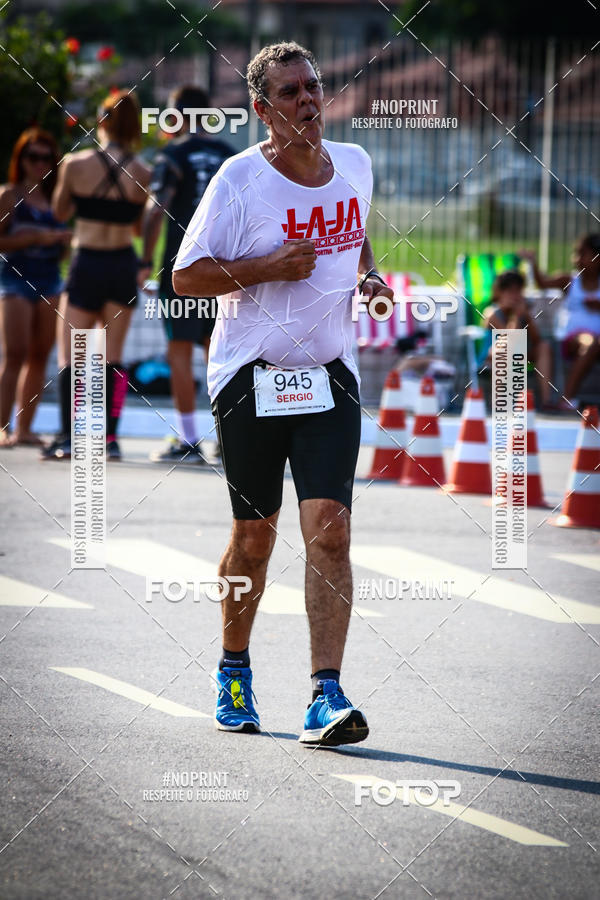 Buy your photos of the eventguia 13K Praia Grande on Fotop