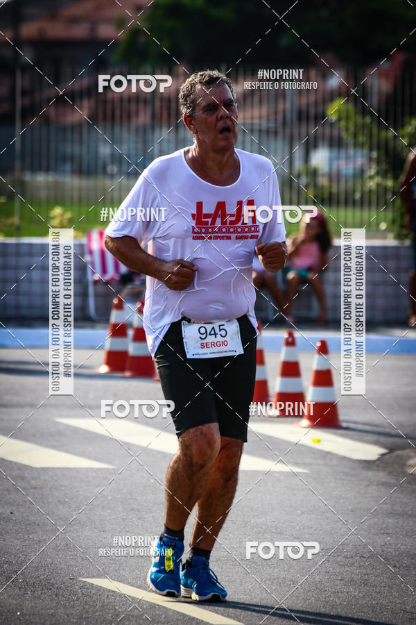 Buy your photos of the eventguia 13K Praia Grande on Fotop
