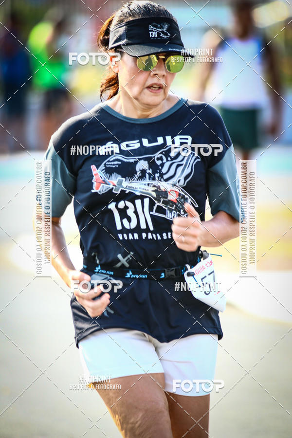 Buy your photos of the eventguia 13K Praia Grande on Fotop