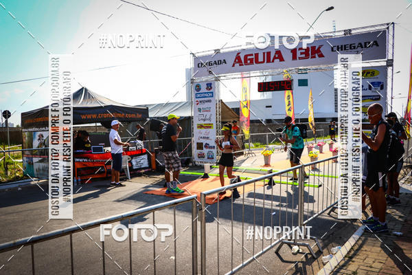 Buy your photos of the eventguia 13K Praia Grande on Fotop