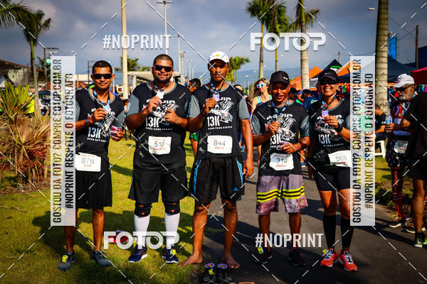 Buy your photos of the eventguia 13K Praia Grande on Fotop