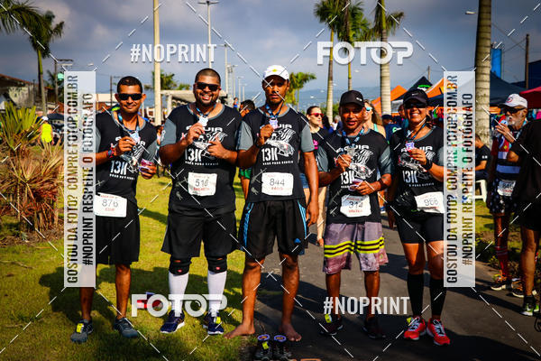 Buy your photos of the eventguia 13K Praia Grande on Fotop