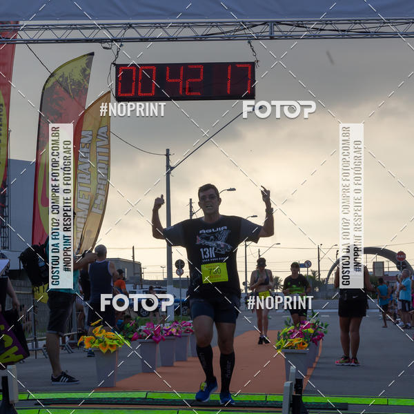 Buy your photos of the eventguia 13K Praia Grande on Fotop