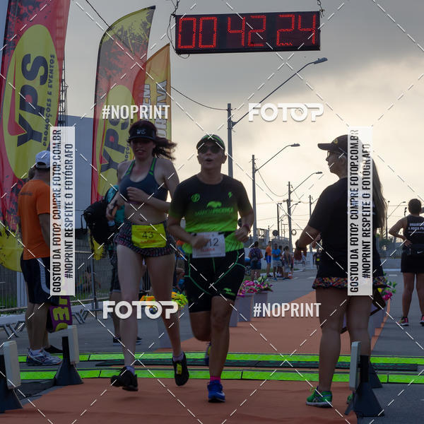 Buy your photos of the eventguia 13K Praia Grande on Fotop